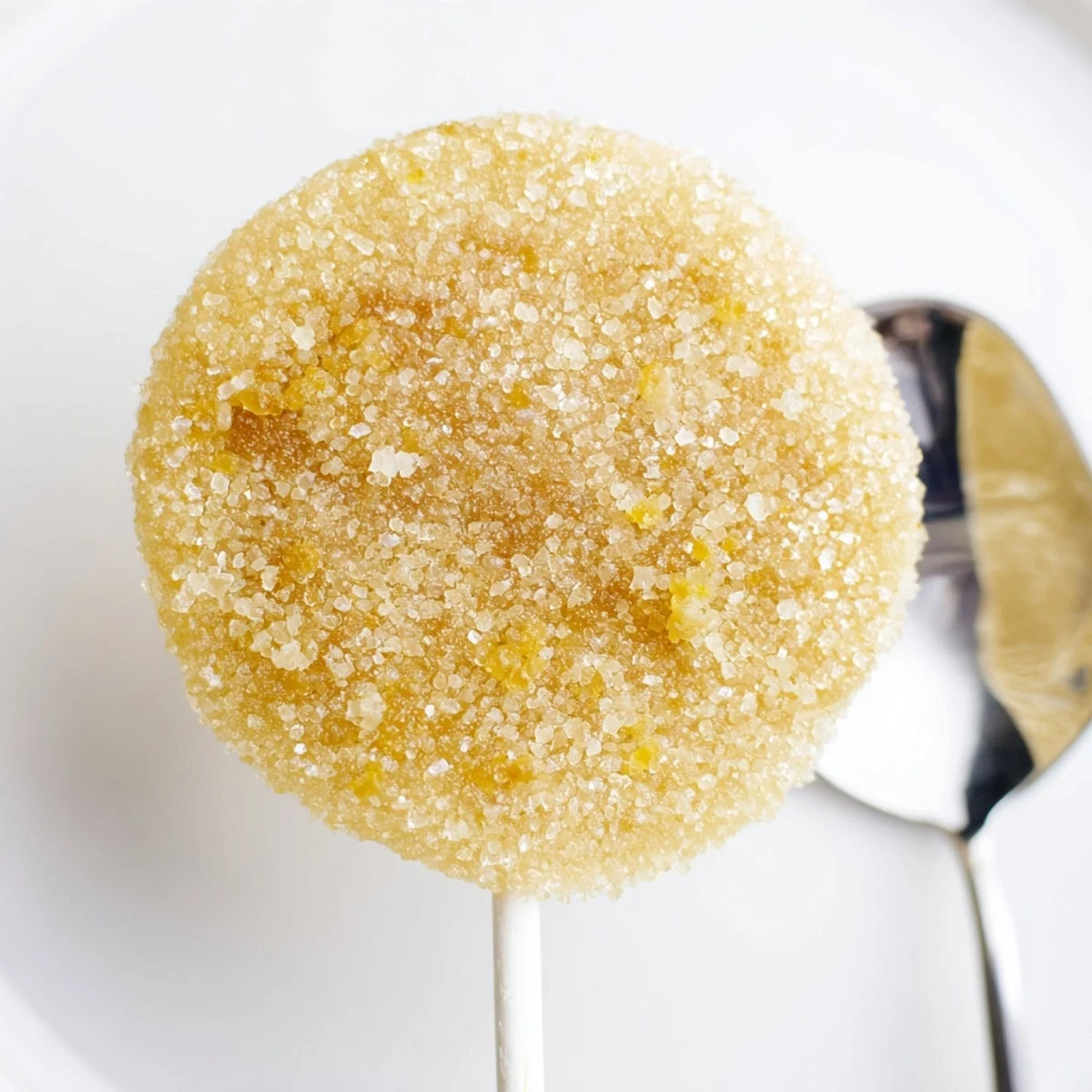 Zesty lemon ginger soda cookie pops on sticks, perfect for festive gatherings.