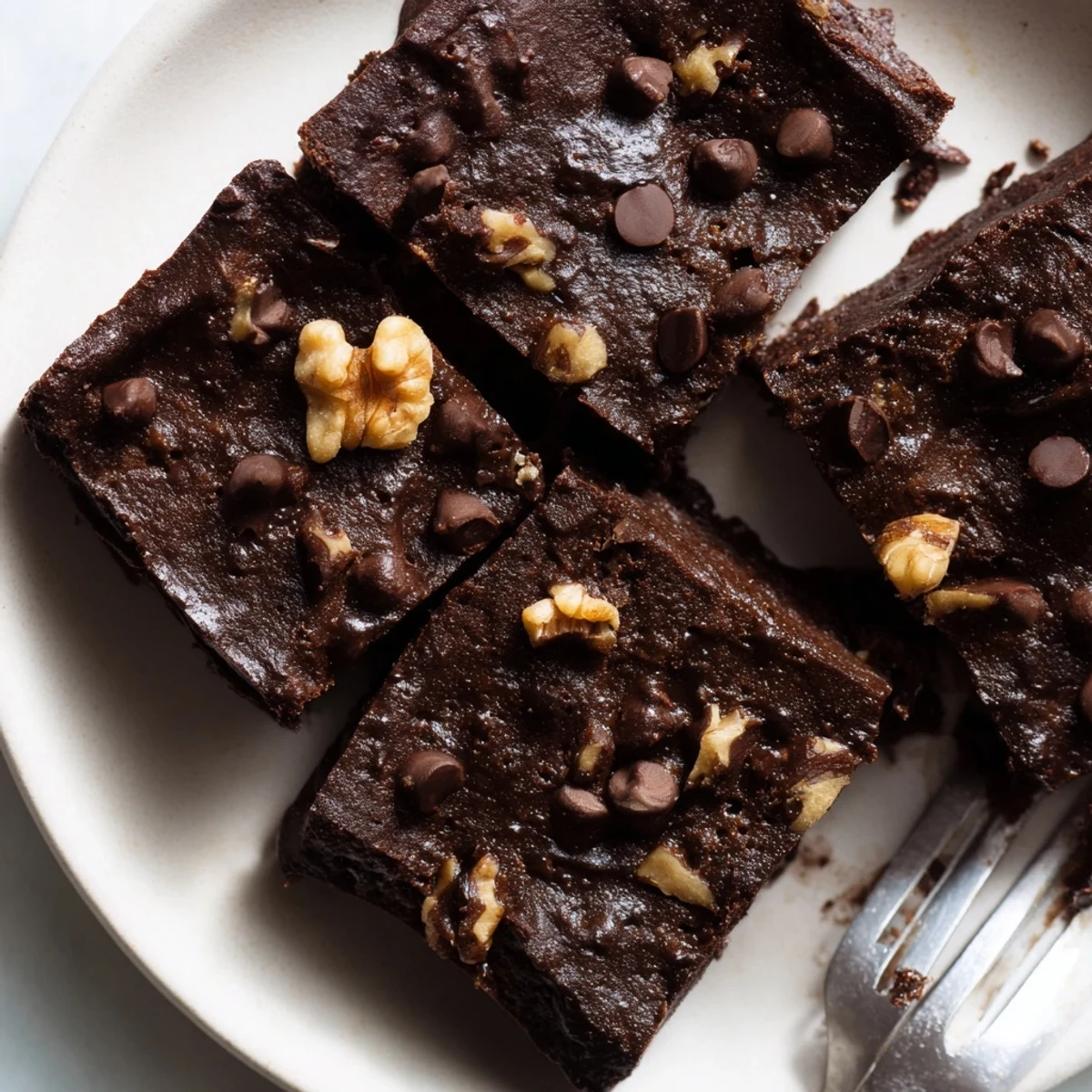 Rich zero-waste brownies made with nut-milk pulp and dark chocolate chips.  