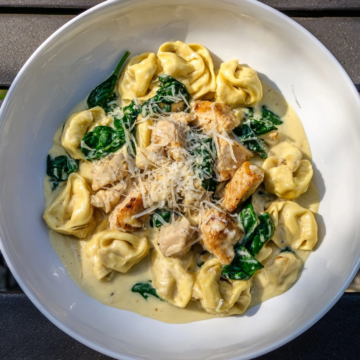 Creamy Chicken and Spinach Tortellini, a vibrant, cheesy pasta dish ready in minutes.