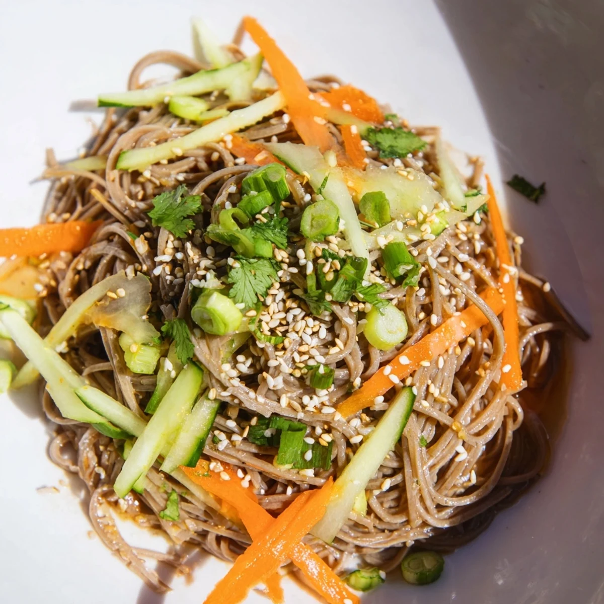 Chilled Noodle Lunch Cups feature vibrant vegetables and a delicious homemade sauce, ready to eat.