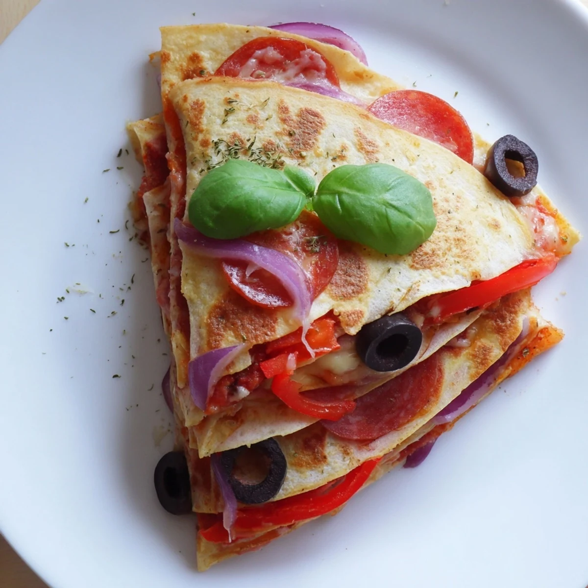 Crispy, cheesy tortilla pizza wraps, a quick and easy Italian-American fusion snack.