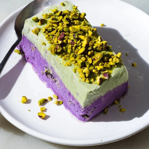 Creamy ube and pistachio ice cream bars, a delightful summer treat for dessert lovers.