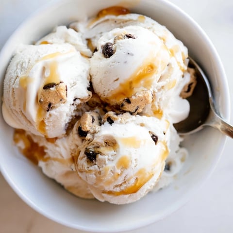 Creamy cottage cheese ice cream swirled with indulgent chocolate chip cookie dough bites.  