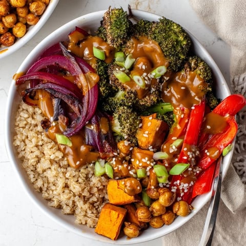 Vibrant Bold Sauce Drizzle Bowls with roasted veggies, topped with miso-butter sauce.