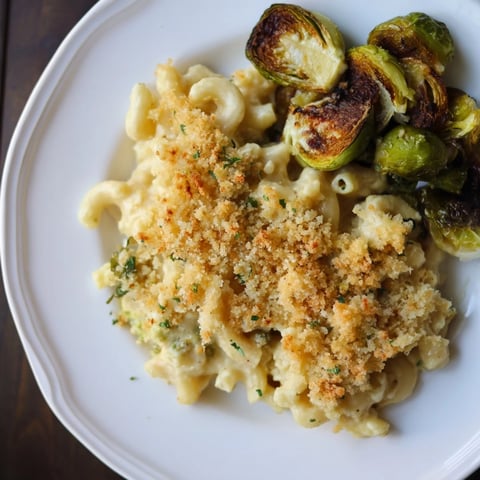 Sheet pan mac and cheese with Brussels sprouts, a bubbly, golden baked delight, ready to serve and enjoy.