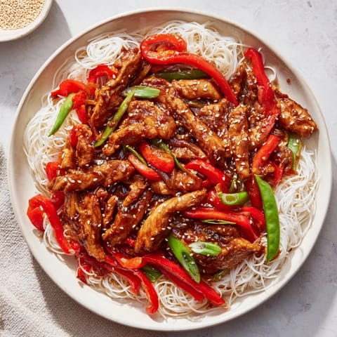 This delicious Mongolian chicken recipe showcases perfectly cooked chicken and a savory, sweet sauce.