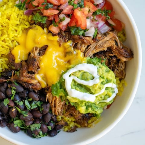 This Chipotle Burrito Bowl copycat recipe showcases a delicious layering of textures and flavors.