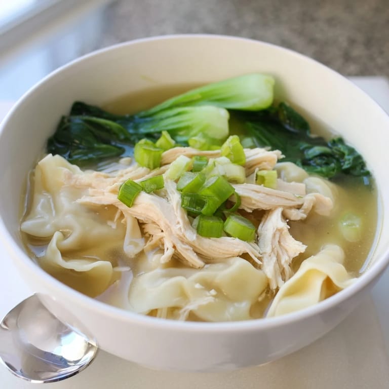 Deliciously quick Simplified Wonton Soup featuring tender wonton strips in rich broth.